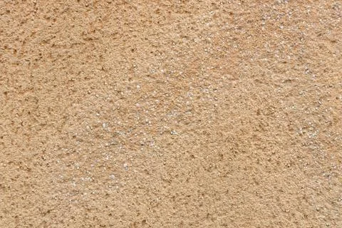 Texture of beige wall covered with limestone plaster, natural sand and stone  Stock-Fotos