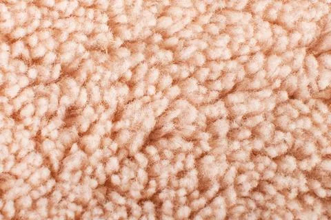 Texture of beige wool macro, textile synthetic background Stock Photos