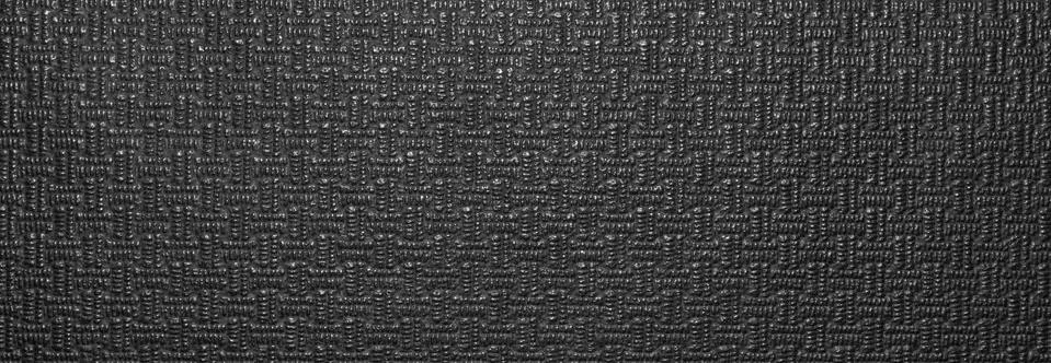 Texture of black artificial leather with a pattern.The background is faux black  Stock Photos