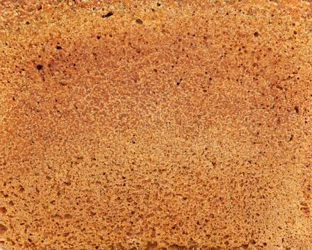 Texture of a black bread Stock Photos