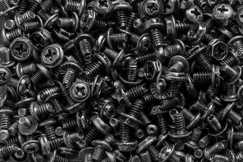 Texture of black computer botls or screws Stock Photos