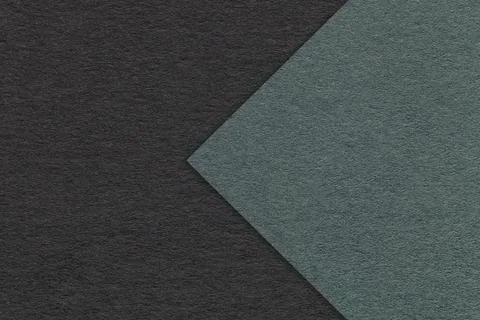 Texture of black paper background, half two colors with dark green arrow, mac Stockfoto's