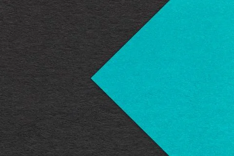 Texture of black paper background, half two colors with turquoise arrow Stock Photos