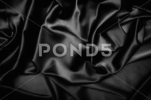 Texture of a black silk Stock Photos