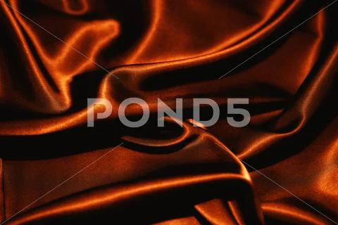 Texture of a black silkcloth red satin silk close up Stock Photos