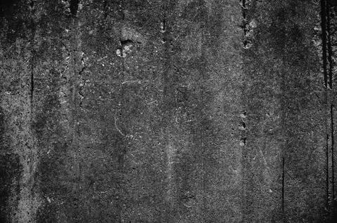 Texture of black white stone wall. Rough surface. Close-up. Dark volumetric Stock Photos
