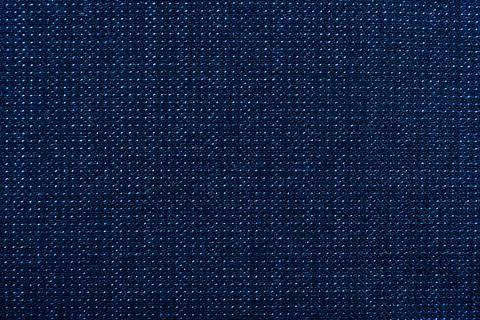 The texture is blue. Background of red material for tailoring Foto stock