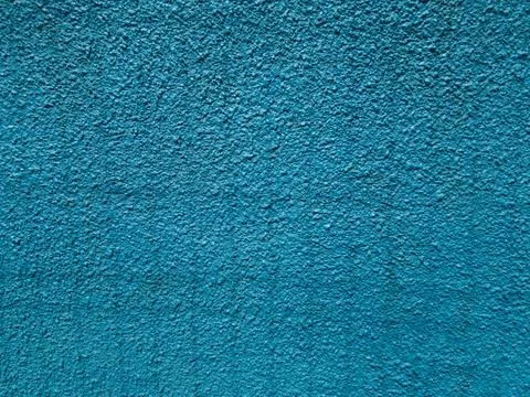 Texture of a blue cement wall with grating shadows Stock Photos