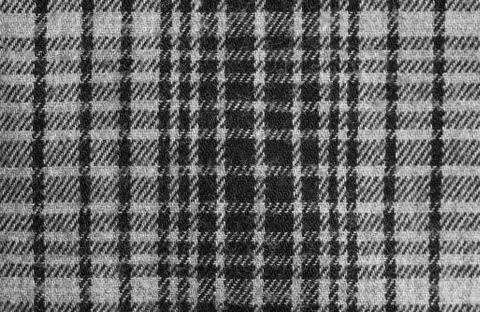 Texture of blue checkered fabric. Stock Photos