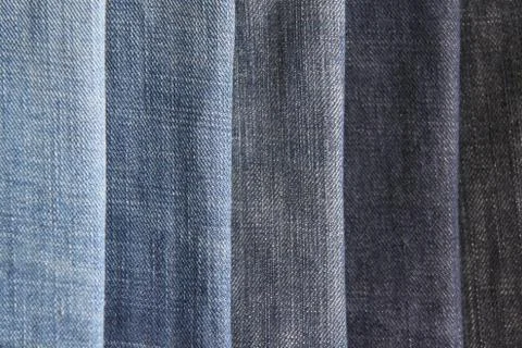 Texture of blue jeans as a background Stock Photos