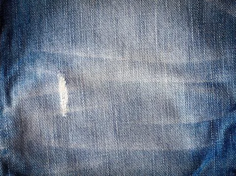 Texture of blue jeans Stock Photos