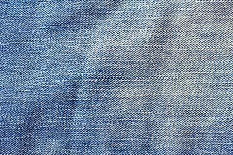 Texture of blue jeans Stock Photos