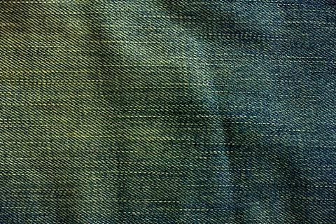 Texture of blue jeans Stock Photos