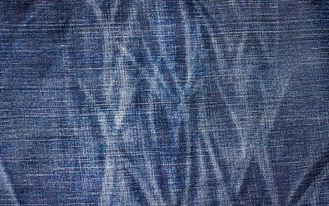 Texture of blue jeans Stock Photos