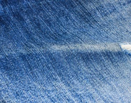Texture of blue jeans Stock Photos