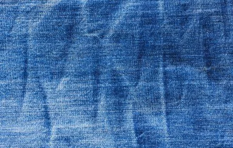 Texture of blue jeans Stock Photos