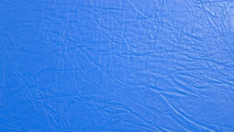 Texture of blue leather surface, fabric for sewing furniture and other products. Stock Footage 136028701