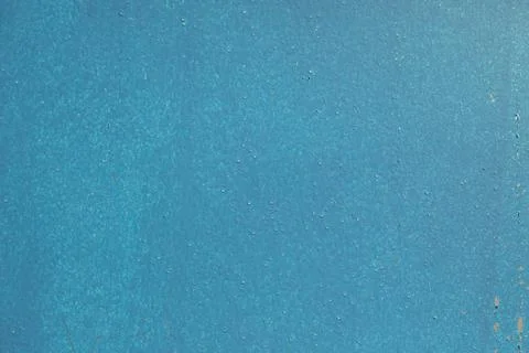 Texture is blue paint. Background is blue wall. Rough surface. Homogeneous co Stockfoto's