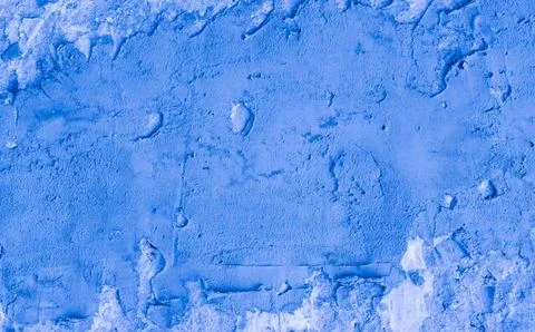 Texture of a blue putty wal. 写真素材