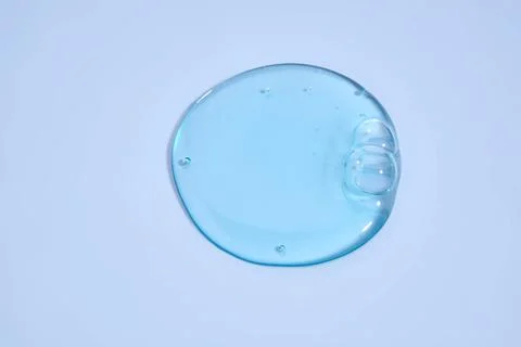 The texture of blue shampoo with bubbles. Stock Photos