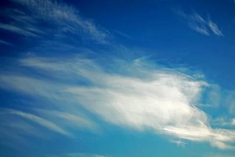 Texture of blue sky with light white clouds watercolor Photos
