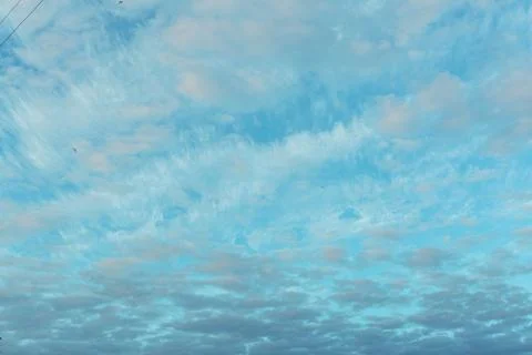 The texture of the blue sky with many blue clouds Stock Photos