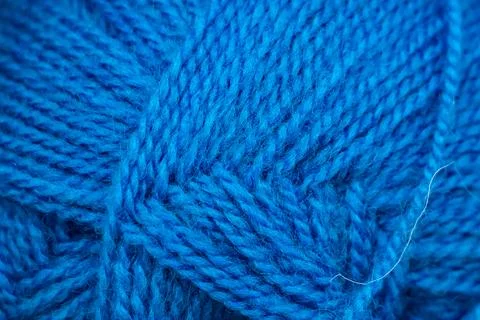 Texture of blue soft woolen threads for knitting. 库存照片