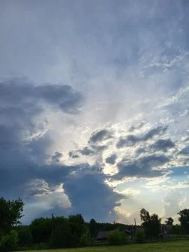 Texture of blue summer sky with white cumulus clouds Stock Photos
