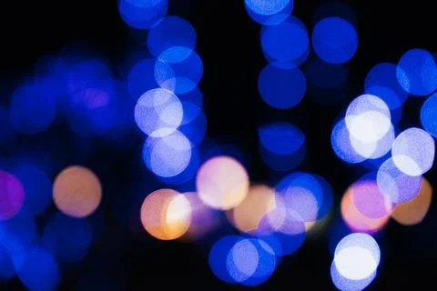Texture of blurred colored lights on a black background Fotos de archivo