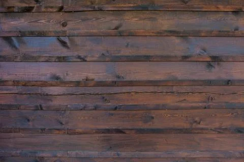 The texture of the boards is dark brown. Foto stock