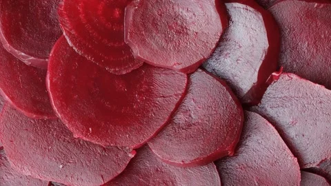 Texture of boiled red beetroot cut into slices top view Stock Footage 314432529
