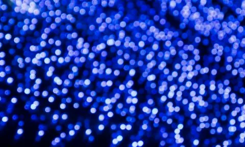 Texture bokeh blurred background of blue lights, rear a blurred background Stock Photos
