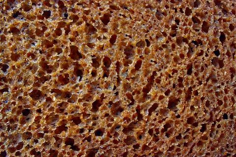 Texture of bread baking fiber, rye closeup, healthy food Stock Photos