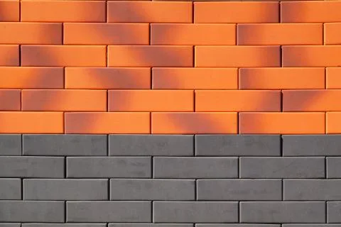 The texture of the brick wall of different colors for construction. Facing Stock Photos