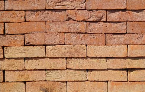 The texture of the brick wall of different colors for construction. Facing Stock Photos