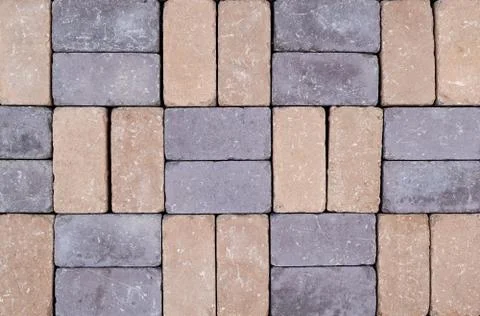 The texture of the brick wall of different colors for construction. Facing bu Stock Photos