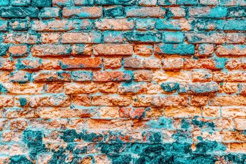 Texture of a brick wall made from an old red brick. Picture taken in Venice. Stock Photos