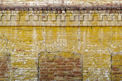 The texture of a brick wall of an old building, with blocked windows Fotos de archivo