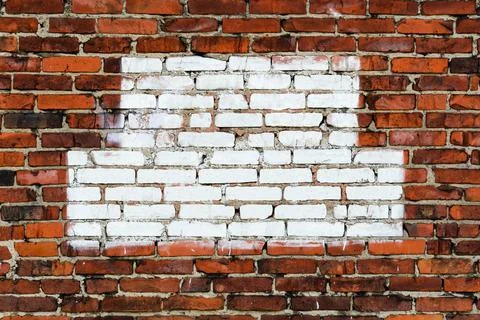 The texture of the brick wall. With white painted space for text. Copy space Stock Photos