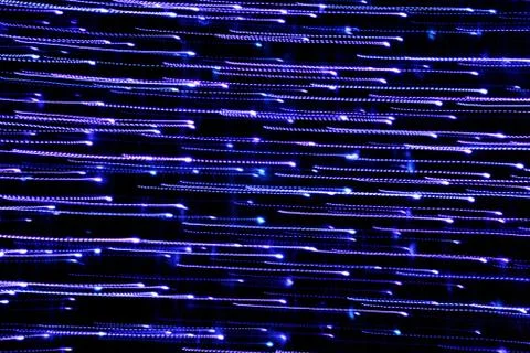 Texture, bright abstract lines, stripes and spots on a black background Stock Photos