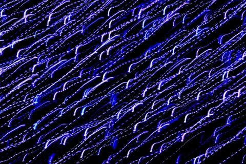 Texture, bright abstract lines, stripes and spots on a black background Stock Photos