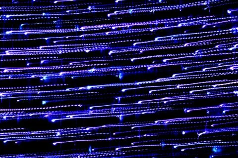 Texture, bright abstract lines, stripes and spots on a black background Stock Photos