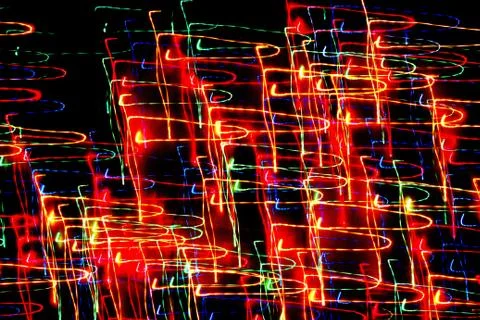 Texture, bright abstract lines, stripes and spots on a black background Stock Photos