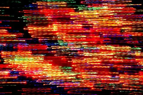 Texture, bright abstract lines, stripes and spots on a black background Stock Photos