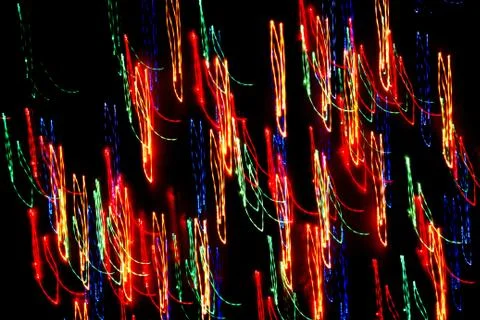 Texture, bright abstract lines, stripes and spots on a black background Stock Photos