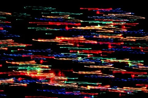 Texture, bright abstract lines, stripes and spots on a black background Stock Photos
