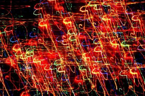 Texture, bright abstract lines, stripes and spots on a black background Stock Photos