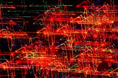 Texture, bright abstract lines, stripes and spots on a black background Stock Photos