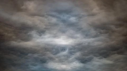 Texture of bright blue dramatic cloudy sky. Stock Photos