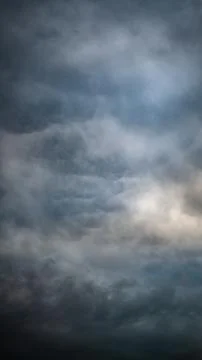 Texture of bright blue dramatic cloudy sky. Stock Photos